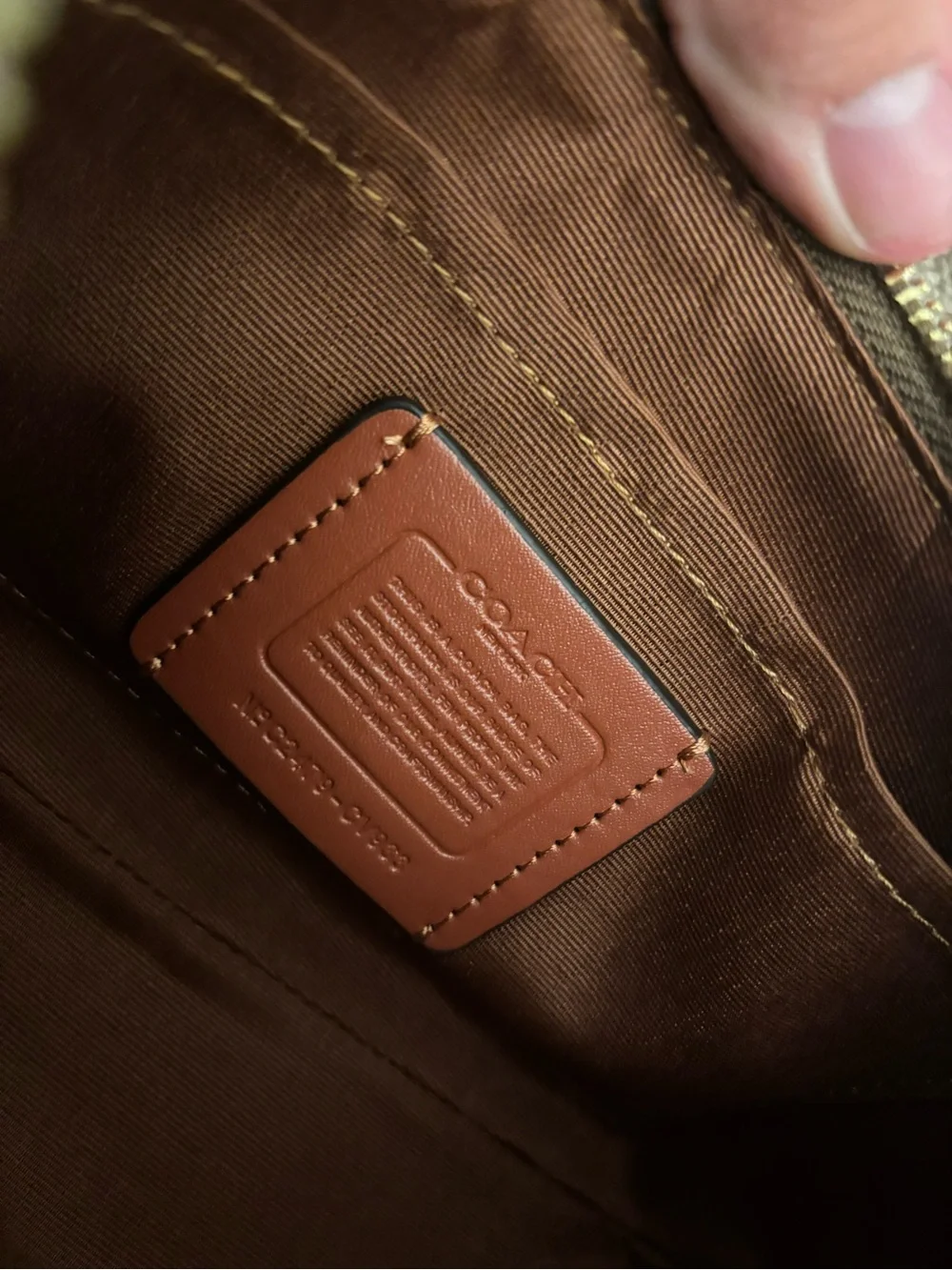 Coach wristlet signature
